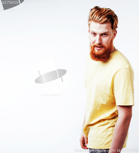 Image of young handsome hipster ginger bearded guy looking brutal isolate