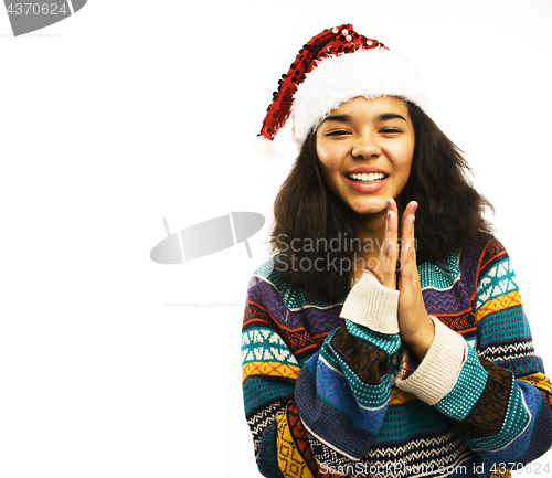 Image of cute young girl in santas red hat isolated