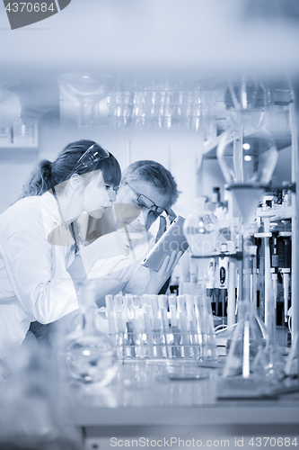 Image of Health care professionals researching in scientific laboratory.