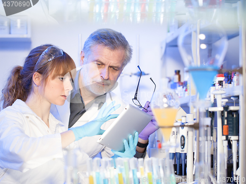 Image of Health care professionals researching in scientific laboratory.