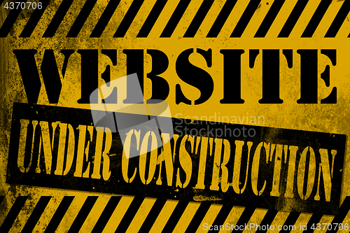 Image of Website under construction sign yellow with stripes