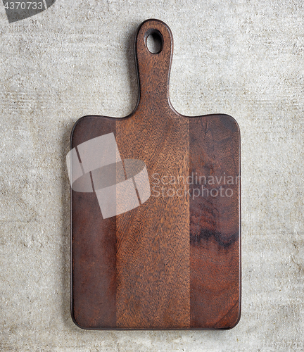 Image of brown wooden cutting board