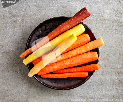 Image of plate of fresh colorful carrots