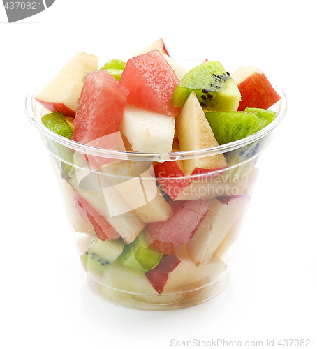 Image of fresh fruit pieces salad in plastic cup