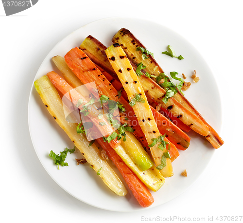 Image of plate of grilled colorful carrots