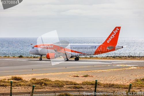 Image of ARECIFE, SPAIN - APRIL, 15 2017: AirBus A320 - 200 of easyjet re