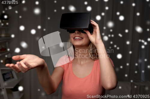 Image of woman in virtual reality headset or 3d glasses