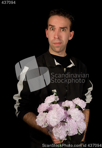 Image of Man Holding Flowers Isolated on Black