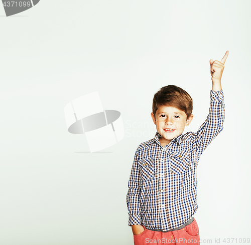 Image of little cute boy on white background gesture