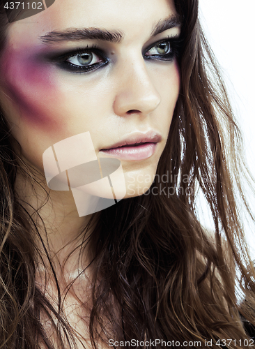 Image of young beauty woman with makeup like shiner on face close up isolated