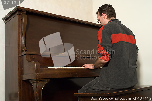 Image of Male Playing Piano