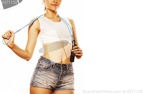 Image of young pretty woman with skipping rope isolated on white