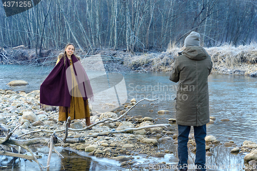 Image of Posing on the background of the river