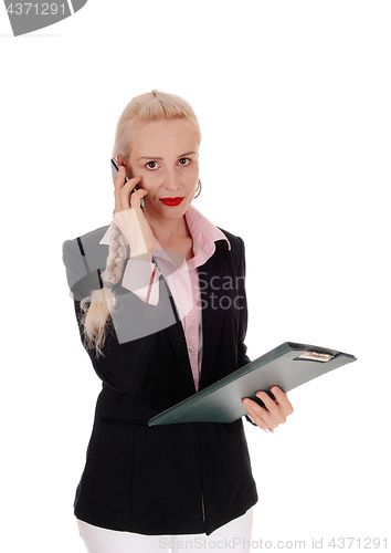 Image of Business woman on her cell phone