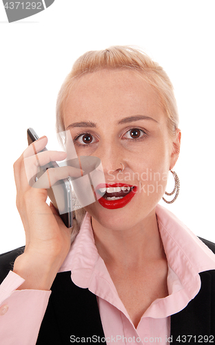 Image of Portrait of businesswoman on her cell phone