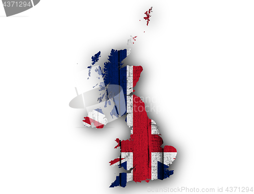 Image of Map and flag of Great Britain on wood,