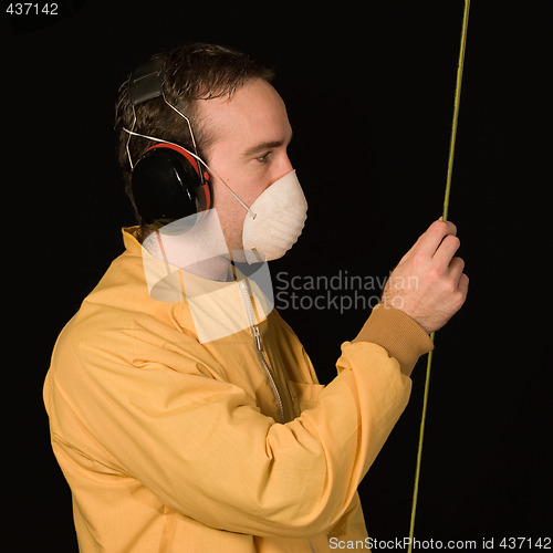 Image of Man Reading A Tapemeasure