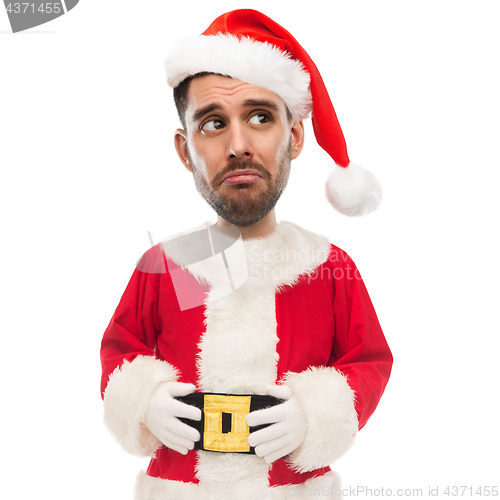 Image of sad unhappy man in santa claus costume