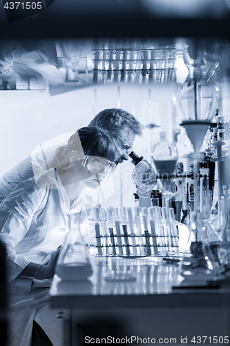 Image of Health care professionals researching in scientific laboratory.