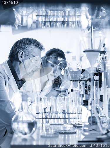 Image of Health care professionals researching in scientific laboratory.