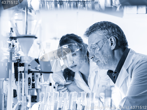 Image of Health care professionals researching in scientific laboratory.