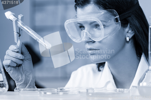 Image of Health care professional researching in scientific laboratory.