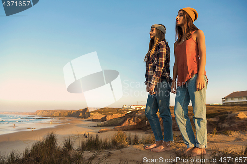 Image of Girls looking the ocean