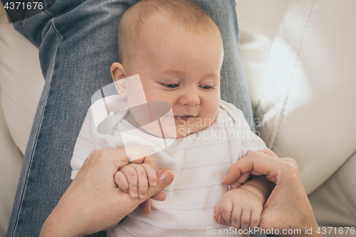 Image of Mother holding sweet baby boy