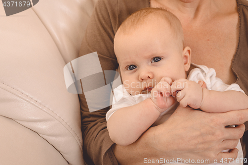 Image of Mother holding sweet baby boy