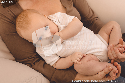 Image of Mother holding sweet baby boy