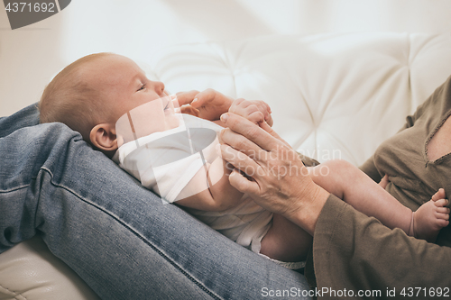 Image of Mother holding sweet baby boy