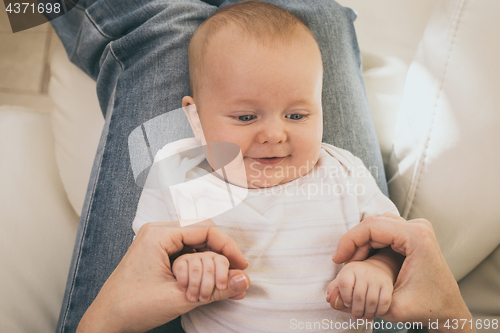 Image of Mother holding sweet baby boy