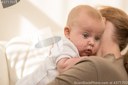 Image of Mother holding sweet baby boy