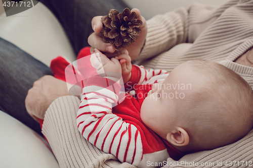 Image of Happy  father having fun with newborn baby son, family portrait 