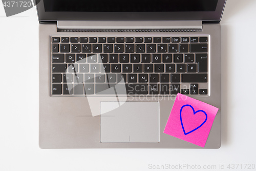 Image of Laptop keyboard with heart note