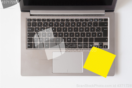 Image of Laptop with blank note