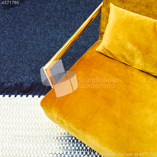 Image of Retro style dark yellow velvet armchair