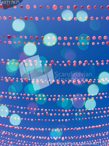 Image of Blue sky background with balloon decorations and bokeh lights