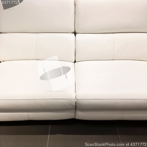 Image of Empty white leather sofa