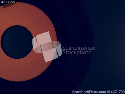 Image of Vintage looking Vinyl on a phonograph rubber platter mat