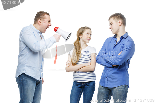 Image of Father screaming at teenage children