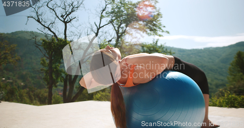 Image of Woman Doing Yoga at villa\'s terase