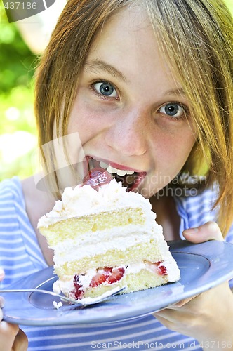 Image of Girl eating a cake