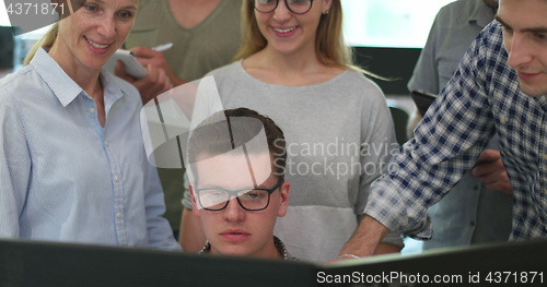 Image of Business Team At A Meeting at modern office building