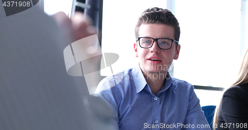 Image of Business Team At A Meeting at modern office building