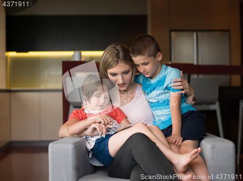 Image of Young Family Using A Tablet To Make Future Plans