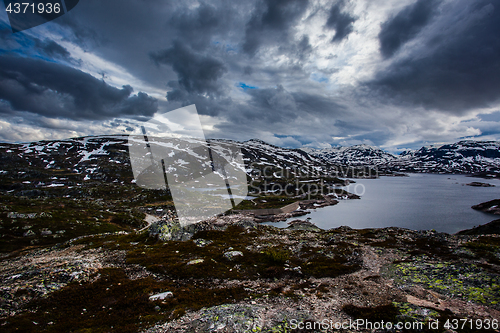 Image of One autumn day with snow on the mountain peaks on the Hardangerv