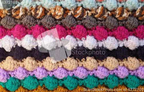 Image of Horizontal multi-coloured stripes of bobble crochet stitches bac