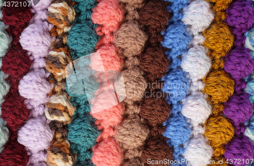 Image of Vertical bobble crochet stitches, multi-coloured wool striped ba