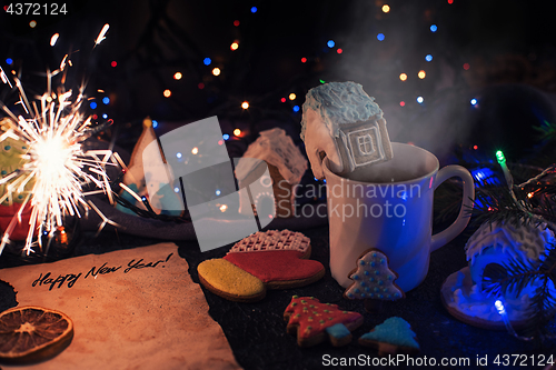 Image of Christmas cookies and cup of tea